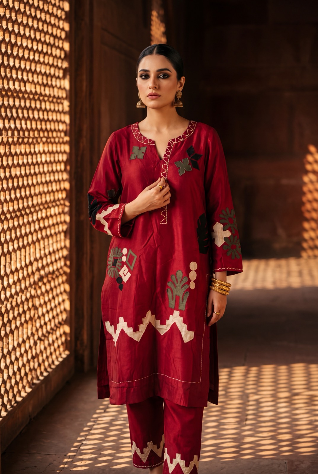Deep crimson/maroon raw silk two-piece: kurta and matching trousers