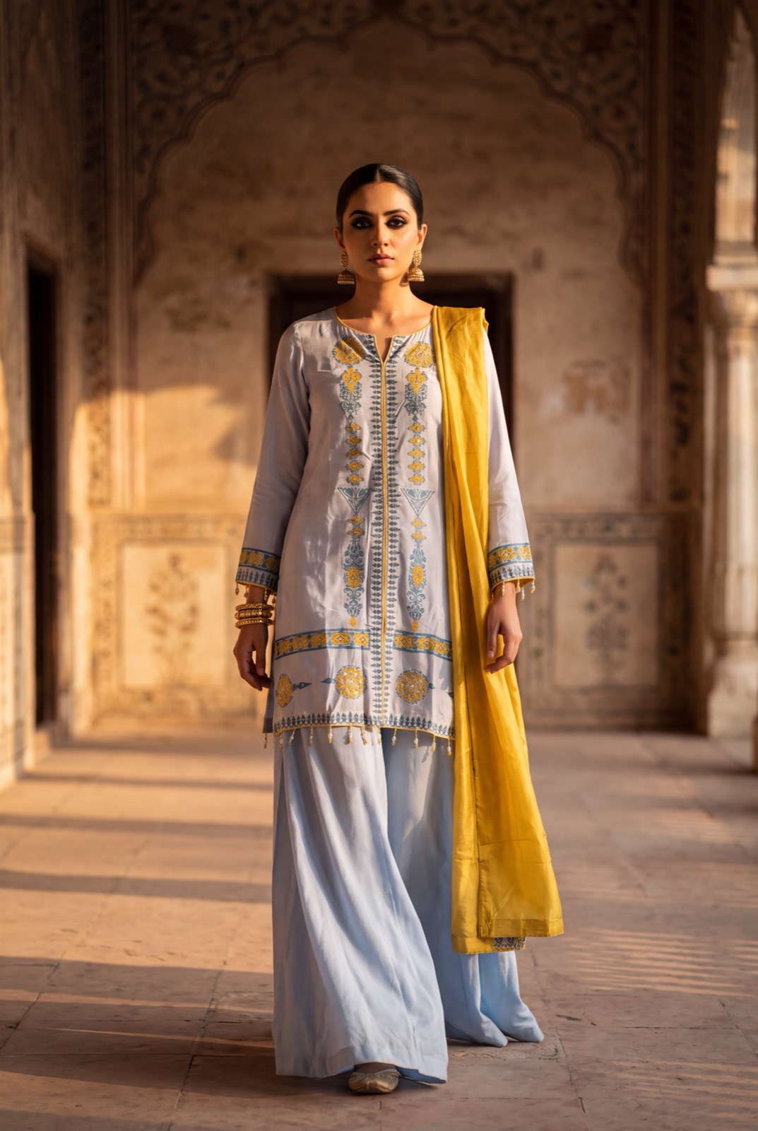 Powder blue block-printed silk kurta with mustard silk dupatta